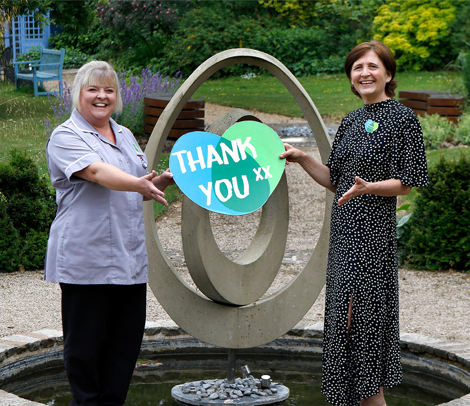 Longfield staff with thank you sign