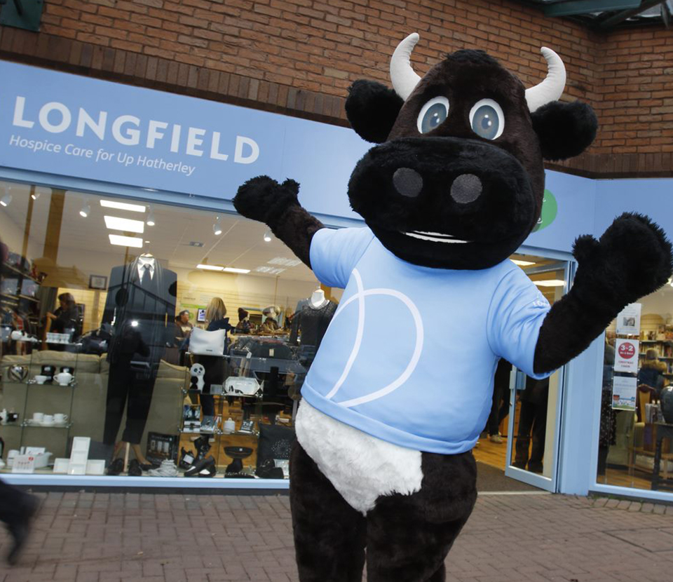 Longfield mascot outside the Up Hatherley shop